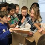 Photo by Brandon Taylor/Whidbey News-Times John Del Pretes fourth-grade class finally sees their published book, Invisible Pollution in the Salish Sea, since beginning the project in September.