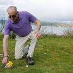 Photo by Kira Erickson/Whidbey News Group                                Charles LaFond demonstrates the celebration he has in mind for Easter Sunday, which involves quiet time and daffodils.