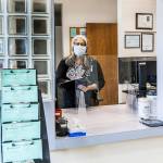 Photo provided                                Maria Reyes, manager of Patient Access Services for the new Clinton walk-in clinic, looks over last minute details before welcoming patients at the office, scheduled to open on Tuesday, June 2.