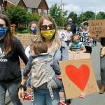 Photo by Kira Erickson/Whidbey News-Times                                Protesters from all over South Whidbeyand some from North Whidbeyjoin the weekly ritual of standing together on Cascade Avenue in Langley with colorful signs. These past two weeks have focused on Black Lives Matter.