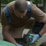 North Whidbey Fire and Rescue firefighter, Andrew Schmal gives oxygen to a cat rescued from the fire.                                Photo by Brandon Taylor