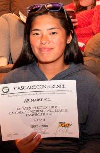 Ari Marshall holds up one of her all-conference certificates. (Photo by Paul Lien)