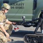 Lt. Nick Woods, attached to Explosive Ordnance Disposal Mobile Unit (EODMU) 5, controls a Mark II Talon remotely operated vehicle (ROV) during a Certification Exercise (CERTEX) on Naval Air Station Whidbey Island, Wash., July 16. Elements of EODMU-1 and EODMU-5 qualified as ready for future operational deployments during the CERTEX, which centered on integrating the two units Sailors with a goal of building a cohesiveness that will help them counter undersea threats and contribute to winning the high-end fight once deployed in support of Navy and geographic combatant command mission priorities. U.S. Navy EOD is the worlds premier combat force for eliminating explosive threats so the Fleet and nation can fight and win wherever, whenever and however it chooses. U.S. Navy photo by Mass Communication Specialist 2nd Class Marc Cuenca/Released