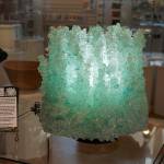 Photo by Kira Erickson/Whidbey News Group                                Glass artist Morgan Bell has been making lamps and other fixtures out of shattered tempered glass that is fused together.