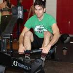 Photo prvoided                                Above, Frank Asciotti works on a rowing machine to build up strength and endurance. Photo below, Peter Oakley has competed in 23 Whidbey Island Triathlons. Here he bikes to first place in the 2002 event.