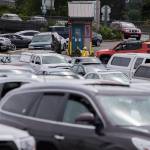 Photo by Olivia Vanni/Herald file                                Cars full of passengers headed to Whidbey Island pull into the ferry lines in Mukilteo on June 26.