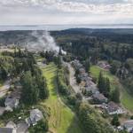 Using garden hoses, neighbors help fight fire