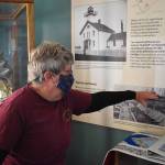 Cheri Anderson knows every nook and cranny of Admiralty Head Lighthouse and enjoys sharing the structures 117-year-old history with visitors. Photo by Emily Gilbert/Whidbey News-Times.                                Cheri Anderson knows every nook and cranny of Admiralty Head Lighthouse and enjoys sharing the structures 117-year-old history with visitors. Photo by Emily Gilbert/Whidbey News-Times.