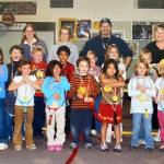 This photo of a past youth summer tennis camp includes many of 2020 team members. (Photo provided by Karyle Kramer)