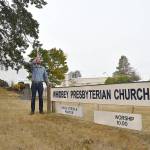 Drivers honk at Whidbey Presbyterian Churchs new pastor, Greg Steible, before he gave his first sermon. Photo by Emily Gilbert/Whidbey News-Times