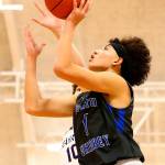 South Whidbeys Jacob Ng goes to the hoop for the Falcons last season. This years basketball season is in jeopardy if COVID-19 numbers dont improve. (Photo by John Fisken)