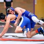 South Whidbeys Drew Aposhyan, top, and the Falcon wrestling team hope to return to play Dec. 28. (Photo by John Fisken)