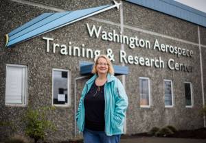 Photo by Olivia Vanni/The Herald
South Whidbey resident Melanie Evans stands outside the Washington Aerospace Training Research Center in Everett.