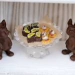 Photo by Kira Erickson/South Whidbey Record
Impossibly small artisan chocolates line the shop windows of the chocolate shop model. Chocolate bunnies, a nod to Langleys plentiful rabbit population, are also part of the display.