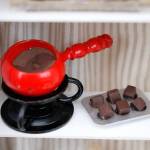 Photo by Kira Erickson/South Whidbey Record
Santosa creates a lot of her tiny foodstuffs out of clay, like this fondue pot.