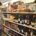The selection of Whidbey-made wines at 3 Sisters Market in Coupeville offers plenty of gift ideas, according to the sisters mom, Shelly Muzzall. Photos by Emily Gilbert/Whidbey News-Times