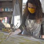 Kaeli Todd traveled from Tacoma to take a water marbling class at Marbley in Coupeville. Photo by Emily Gilbert/Whidbey News-Times