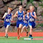 This years Falcon cross country team includes a strong group of seniors, including Reilly McVay, left, Cooper Ullmann, Aidan Donnelly and Thomas Simms, shown here competing in a meet in 2019. (Photo by Karen Swegler)