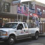 A group of President Trumps supports drove down SE Pioneer Way in Oak Harbor after a rally at the intersection of Highway 20 and SE Pioneer Way Wednesday afternoon. Photo by Emily Gilbert/Whidbey News-Times