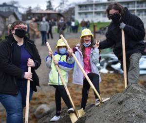 Victoria Adaus Myers, left, broke ground on a new home this week with her family, Arryn, 6, Katherine, 8, and Aaron. Photo provided.