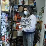 Photo by Kira Erickson/South Whidbey Record
Cindy Buchanan, founder of Whidbey Island Angels, grabs a jar of pasta sauce from the resource centers expansive food pantry.