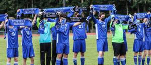 Photo by Matt Simms
‘Scarves Up’ soccer tradition that in this case was done in honor of fallen teammate and friend Taylor Daniels. The scarves were specially made in tribute to Taylor and are inscribed with his name and jersey number and the saying ‘Forever a Falcon’. They were given to Taylor’s mother by Coach Fuss and to the rest of Taylor’s extended family by the players who then raised them over their heads in the ‘Scarves Up’ pregame tradition for a moment of silence to honor Taylor’s memory.