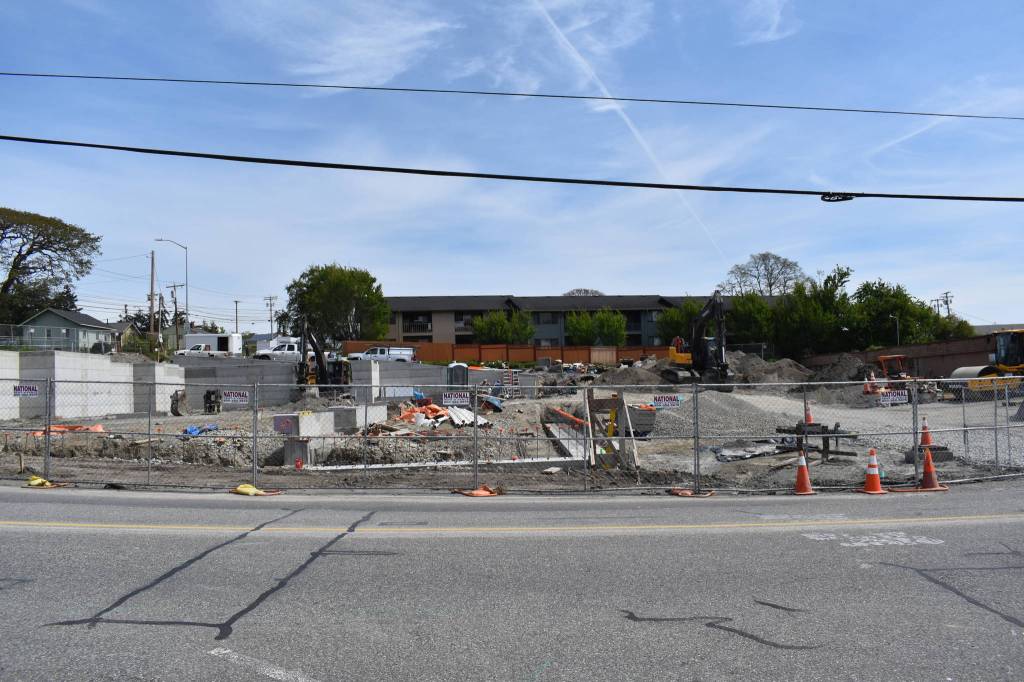 The apartment building across the street from the post office