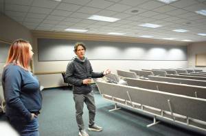 Whidbey Homeless Coalition Executive Director Jonathan Kline explains how 15 bunks will be set up in the sanctuary of the former Jehovahs Witness church outside Coupeville. Photo by Emily Gilbert/Whidbey News-Times