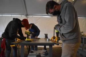 Photo by Emily Gilbert/Whidbey News-Times
Seniors Anthony Pierzchala, right, and Charlie Dubois working with junior Eric Lindsey, back left, during teacher Chris Whitemans advanced engineering class. Someone stole $1,000 worth of tools from the program earlier this month.
Seniors Anthony Pierzchala, right, and Charlie Dubois working with junior Eric Lindsey, back left, work on projects during teacher Chris Whitemans advanced engineering class. Photo by Emily Gilbert/Whidbey News-Times