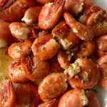 Photo by Emily Gilbert/Whidbey News-Times
Chopped garlic and parsley and salt and spot shrimp in 2020.