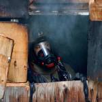 Ed Klaszky, a firefighter with Clark County Fire Dept. in Nevada, during a controlled burn training exercise organized by the Oak Harbor Fire Department on Saturday, May 22. Photo by Bryan Fick/WestCoast Fire Media