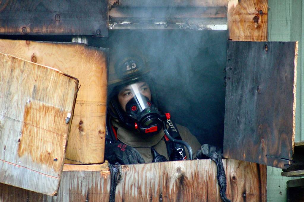 Ed Klaszky, a firefighter with Clark County Fire Dept. in Nevada, during a controlled burn training exercise organized by the Oak Harbor Fire Department on Saturday, May 22. Photo by Bryan Fick/WestCoast Fire Media