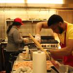 Jamel Hale and his wife, Roe, prepare to open their restaurant for dinner. (Photo by Karina Andrew/Whidbey News-Times)