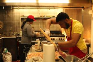 Jamel Hale and his wife, Roe, prepare to open for dinner May 20. (Photos by Karina Andrew/Whidbey News-Times)