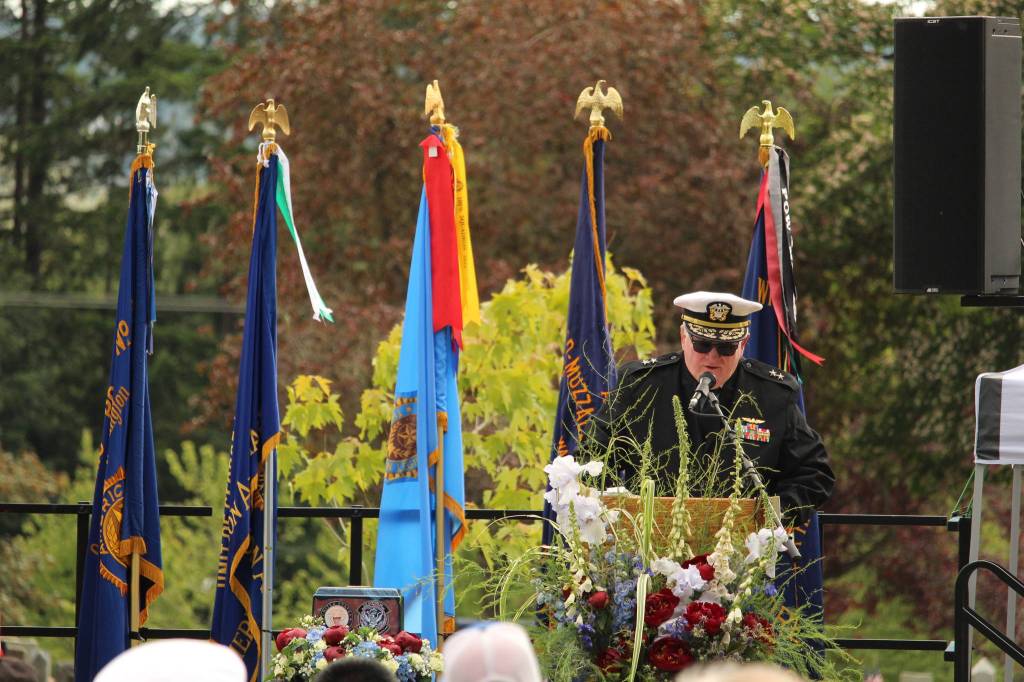 Rear Admiral William J. McDaniel speaks.
