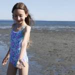 Ava Forsberg, 11, shows off a jellyfish she found.
