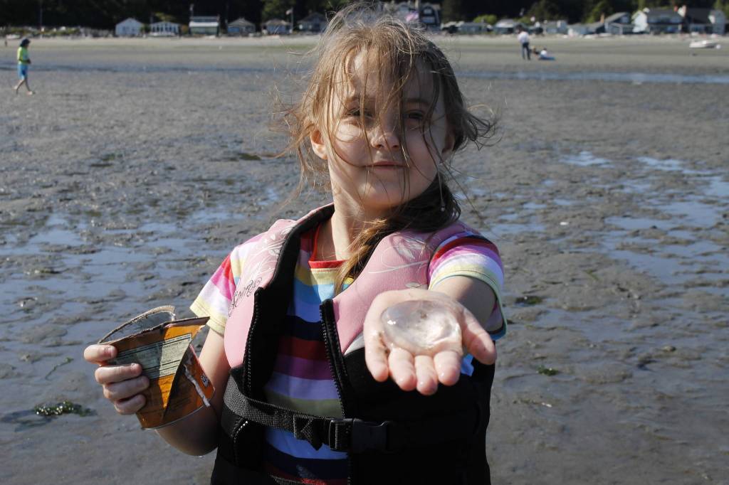 Maci Knauer, 7, shows off a jellyfish she released back into the ocean.