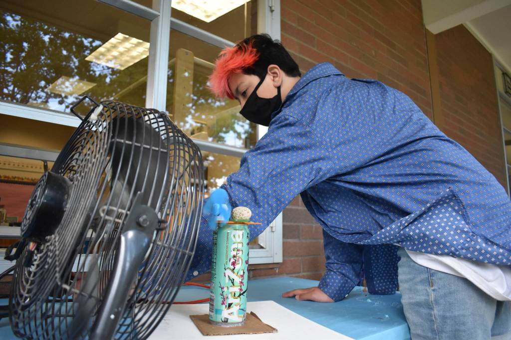 Photo by Emily Gilbert/Whidbey News Group
South Whidbey Elementary sixth-grader Liam Gilles tests a wind turbine he made to learn about alternative energy sources.