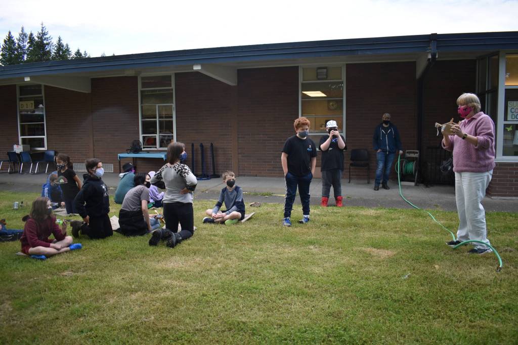 Photo by Emily Gilbert/Whidbey News Group
Jean Cravy, right, talks to her South Whidbey Elementary class about alternative energy sources.