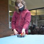 Photo by Emily Gilbert/Whidbey News Group
South Whidbey Elemenatry fifth-grader Max Rieneckert gets ready to test a solar car he made as part of his classs unit to learn about alternative energy.