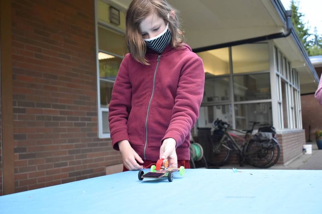 Photo by Emily Gilbert/Whidbey News Group
South Whidbey Elemenatry fifth-grader Max Rieneckert gets ready to test a solar car he made as part of his classs unit to learn about alternative energy.