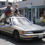Drew Aposhyan, left, and Kaidyn Brinks, celebrate during a car parade held Thursday afternoon for South Whidbey High Schools graduating class.