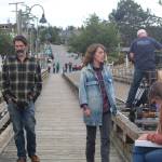 Chris Stack and Samantha Soule film on the Coupeville wharf . (Photo by Karina Andrew/Whidbey News-Times)