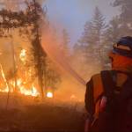 A firefighter battles the Lick Creek fire. (Photo provided by Central Whidbey Island Fire and Rescue)
