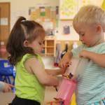Alaina Pyne, 1, and Wyatt Wing, 2, play with crayons in the toddler class at Little Oaks Preschool. The facility has a waitlist but rarely calls anyone on it as they are usually full to capacity. (Karina Andrew/Whidbey News-Times)