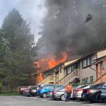 Photo by Rebecca Powers
Nine people are without their homes after a fire burned through several apartments on Northwest Atalanta Street in Oak Harbor Sunday morning.