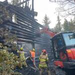 Firefighters respond to a structure fire on Woodbine Road Monday. (Photo courtesy of South Whidbey Fire/EMS)