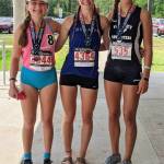 Photo provided by Karen Swegler
Kaia Swegler Richmond, center, shows off her gold alongside second-place finisher Corinn Brewer, right, and third-place finisher McKenzi Popper.
