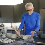 Don Krafft, a South Whidbey volunteer for Community Loaves, shapes some bread dough.