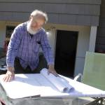 Photo by Kira Erickson/South Whidbey Record
Site manager Bon Thayer surveys the building plans for Tiny Homes in the Name of Christ.